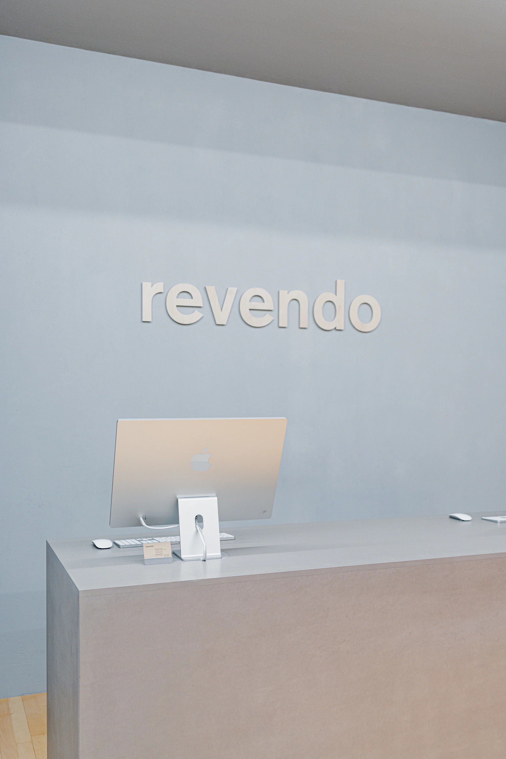 A bright, calm, modern healthcare reception workspace