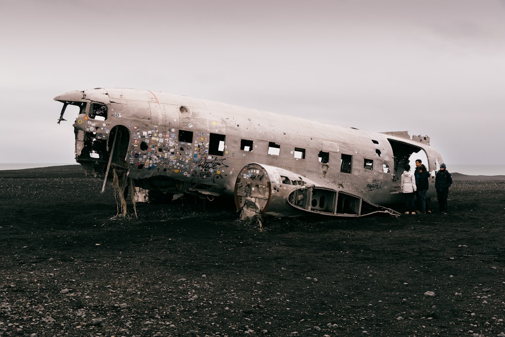 a plane that is sitting in the dirt