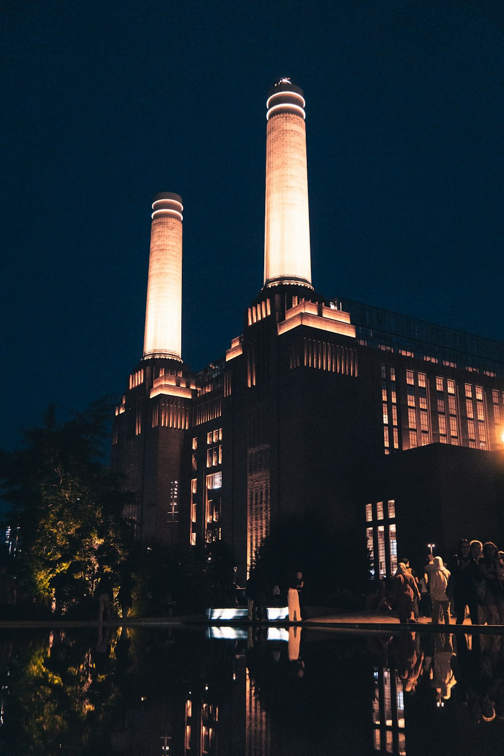 a couple of people standing in front of a building