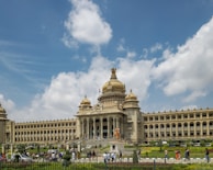 a large building with a lot of people around it