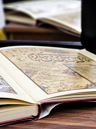 An open ancient book with glowing runes, resting on a velvet cloth with delicate flower petals.