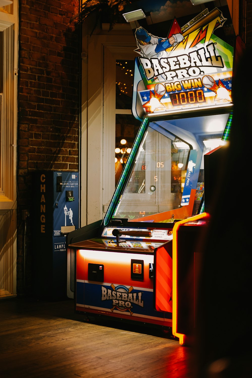 a game machine sitting on top of a hard wood floor