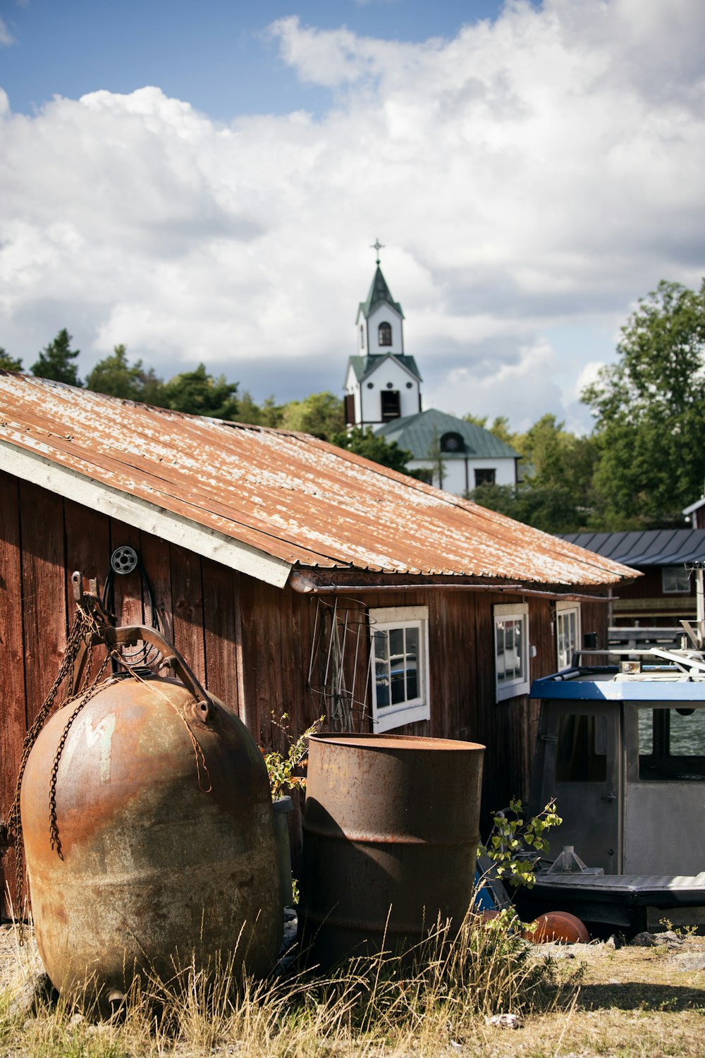 a building with a clock tower in the background