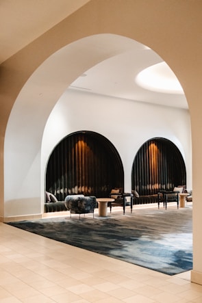 Elegant lounge area with stylish sofas for a corporate event.