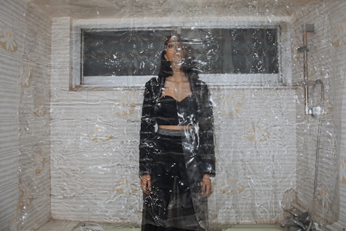 A residential space being covered with protective film.