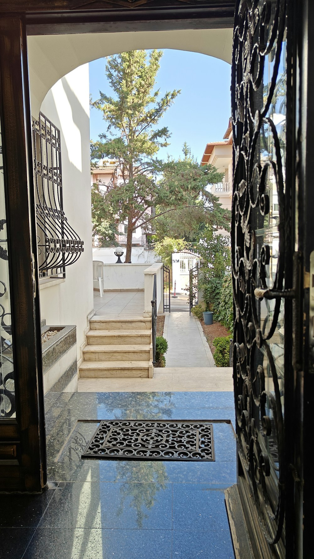 a view of a house through an open door