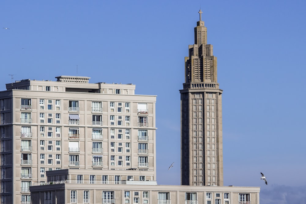 a tall building with a clock on the top of it