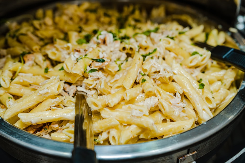 a close up of a plate of food with pasta