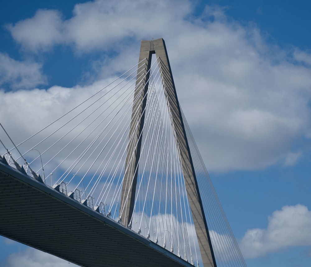 a very tall bridge with a very tall bridge in the background