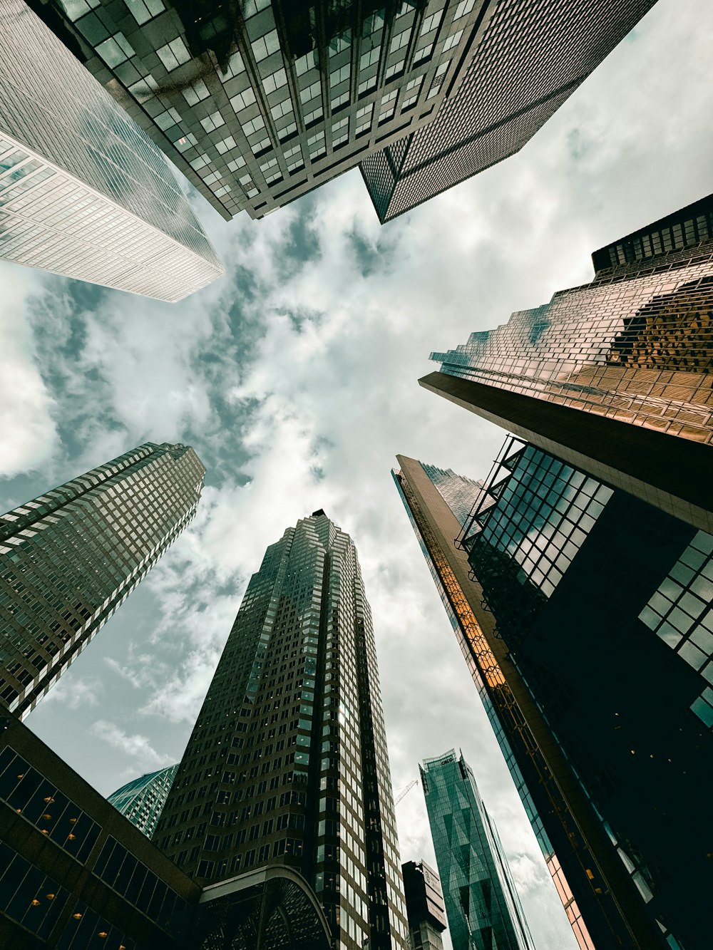 a group of tall buildings standing next to each other