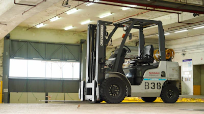 Modern forklift available for rent in a warehouse setting.