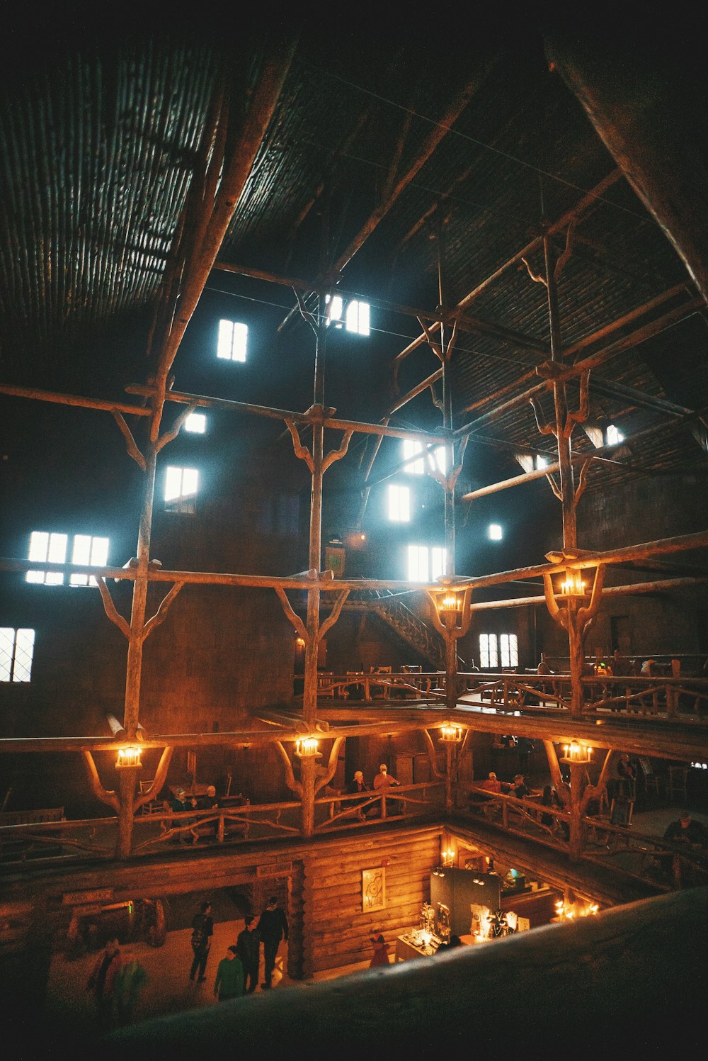 a large building with lots of windows and lights