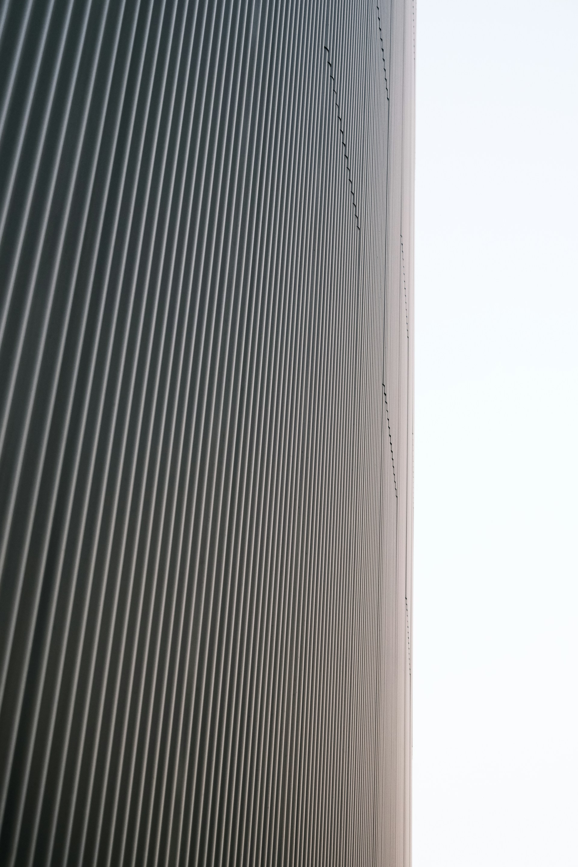 a tall building with a clock on the side of it
