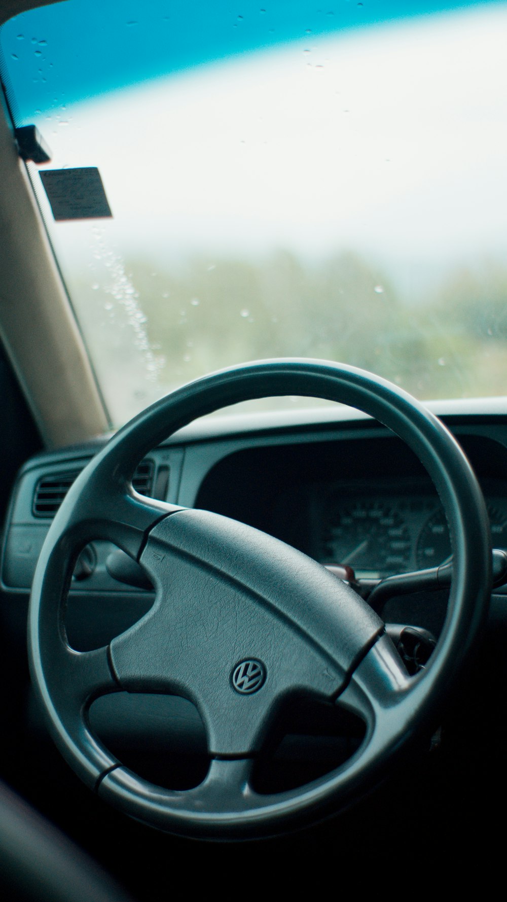 a steering wheel and dashboard of a vehicle