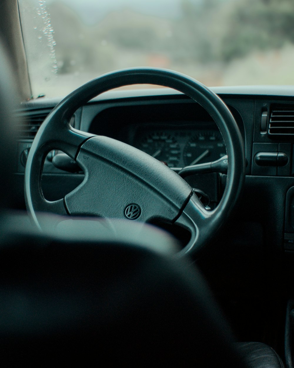 the dashboard of a car with a steering wheel