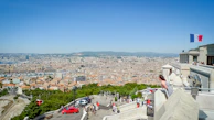 A panoramic view of the Place de la Nation transformed into an open-air art venue.