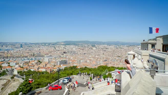 A panoramic view of the Place de la Nation transformed into an open-air art venue.