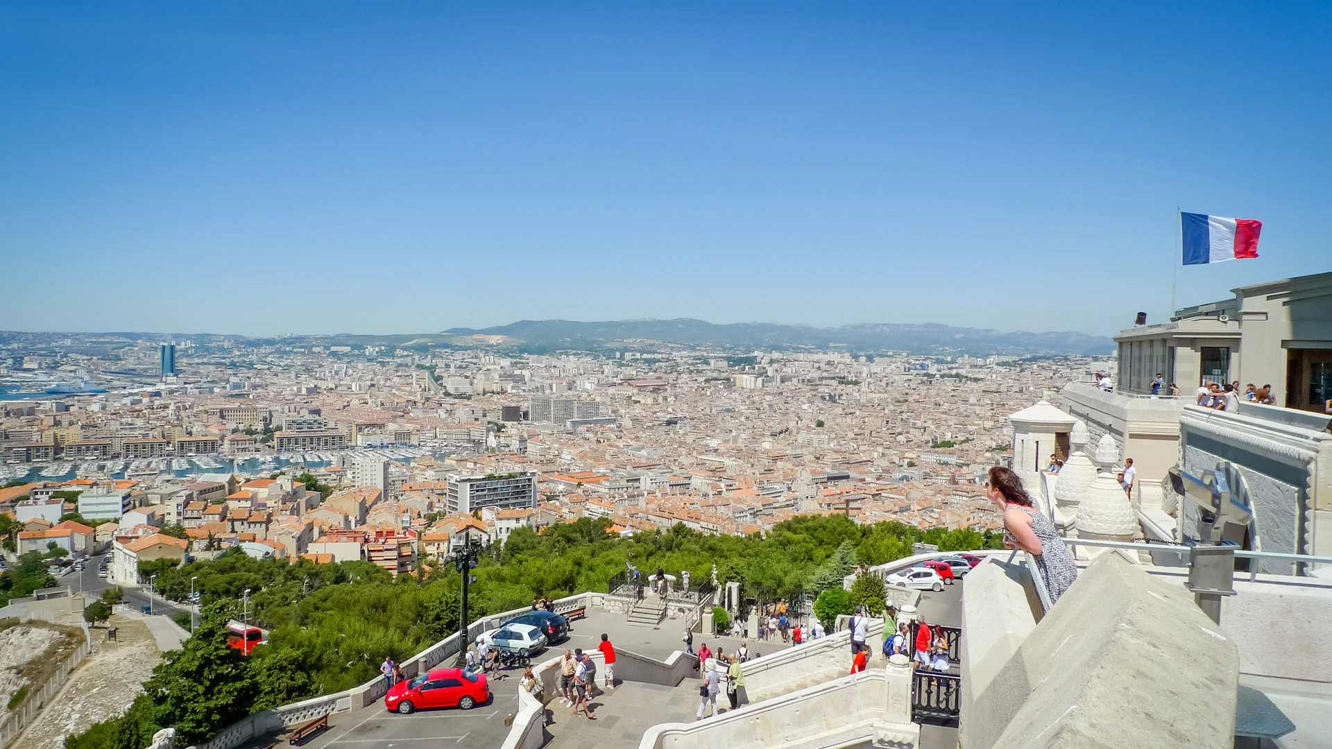 woman wearing yellow long-sleeved dress under white clouds and blue sky during daytime