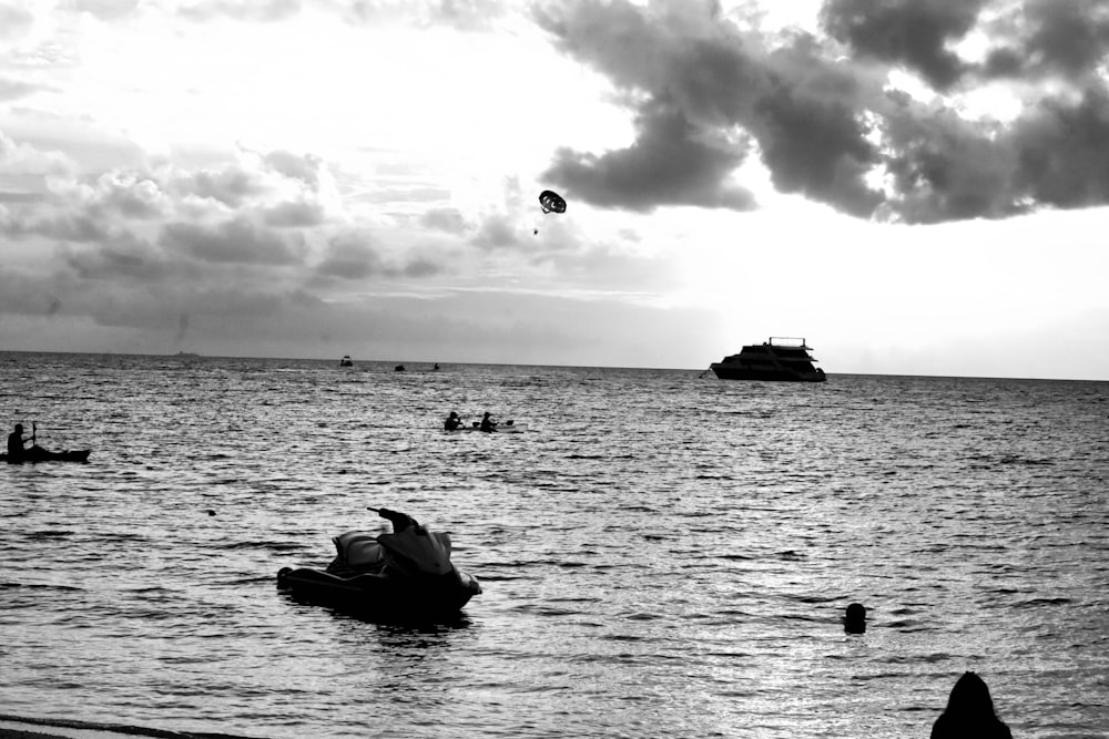 a group of people on a boat in the water