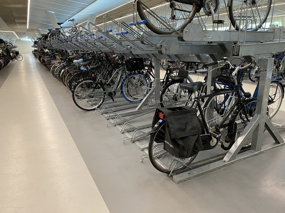 a bunch of bikes that are on a rack