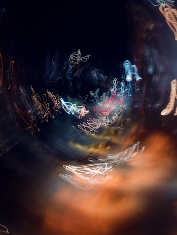 An abstract 3D VFX scene featuring swirling neon particles and dynamic light trails.