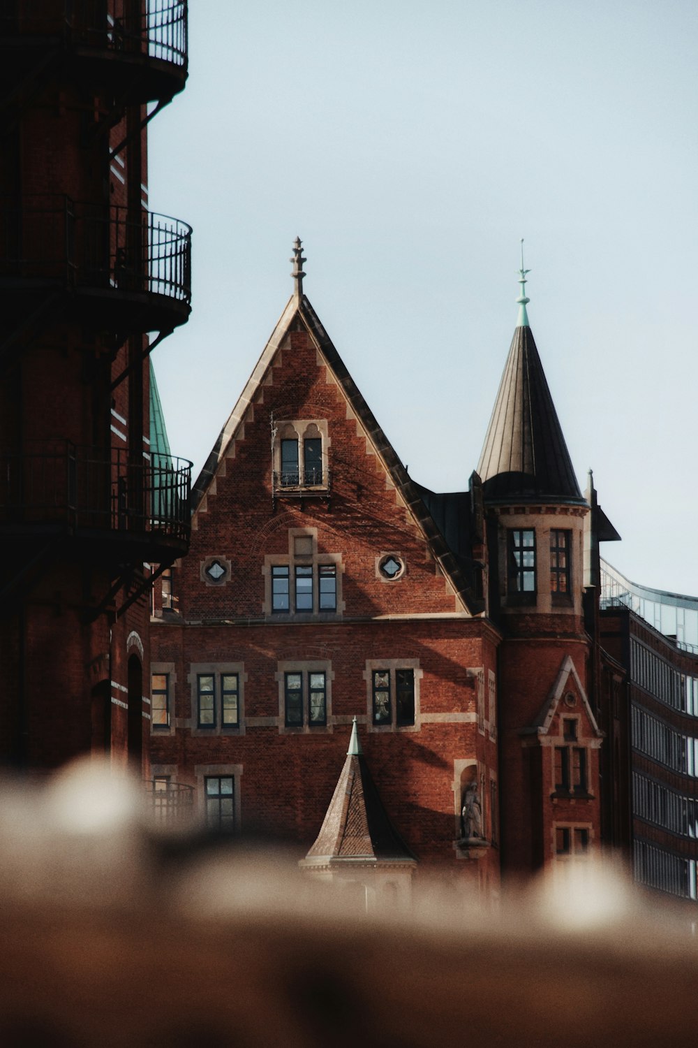 a large brick building with a clock tower