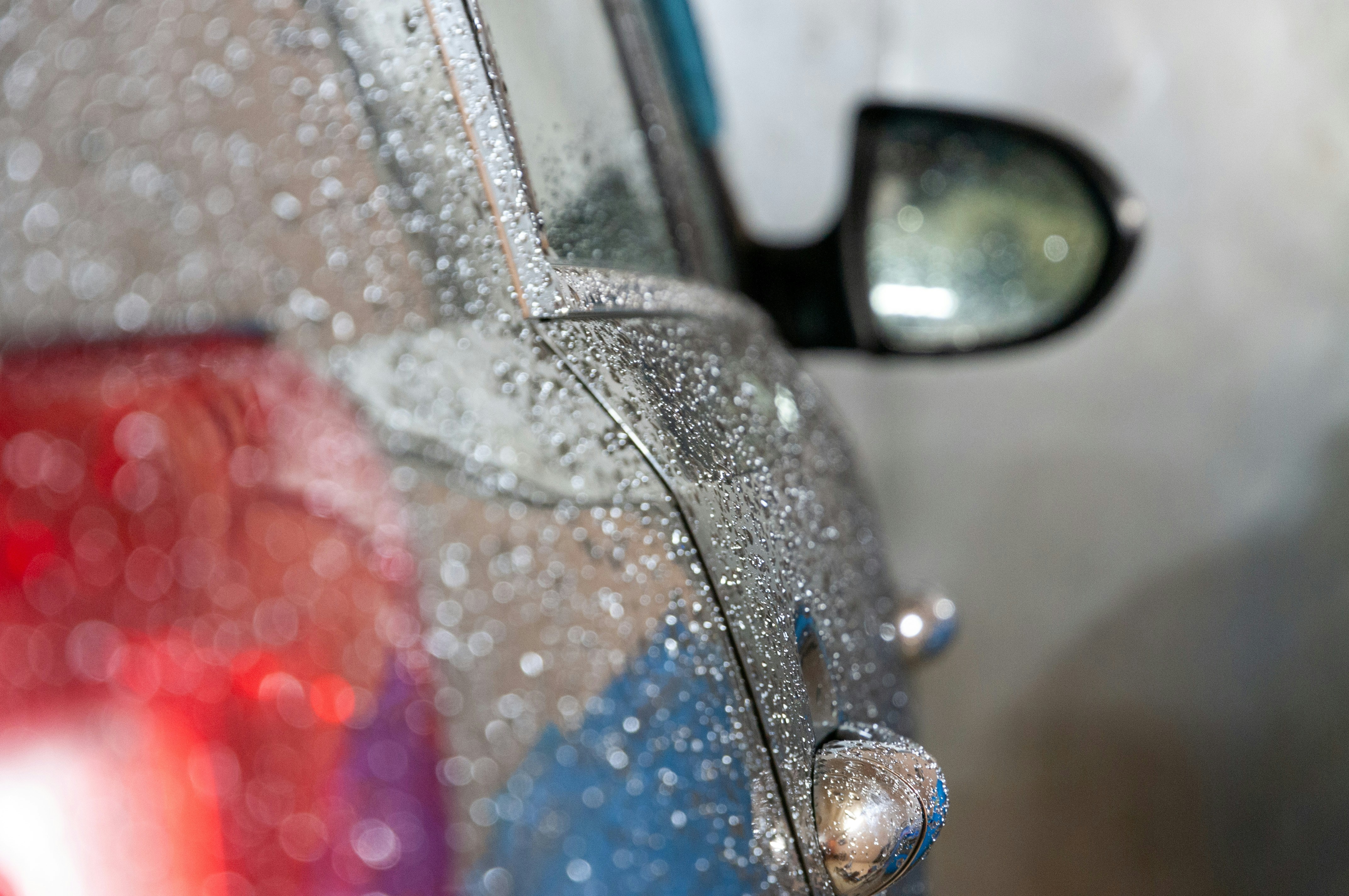 a close up of a car's rear view mirror