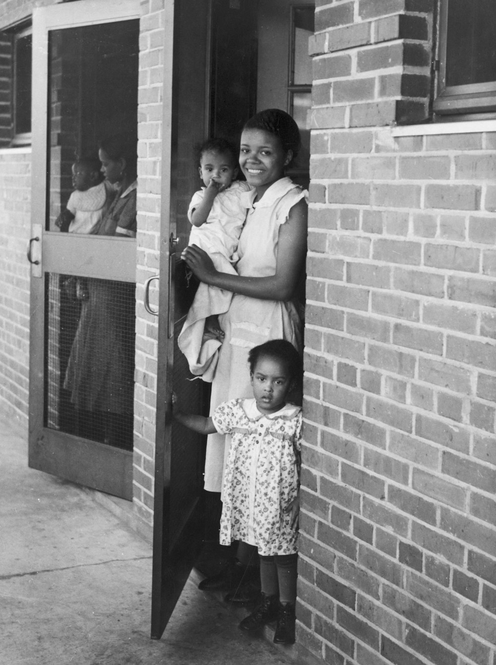 Memphis, Tenn. Mar. 1939. Families at Dixie home, a US public works administration project covering 42 acres of former slum area.