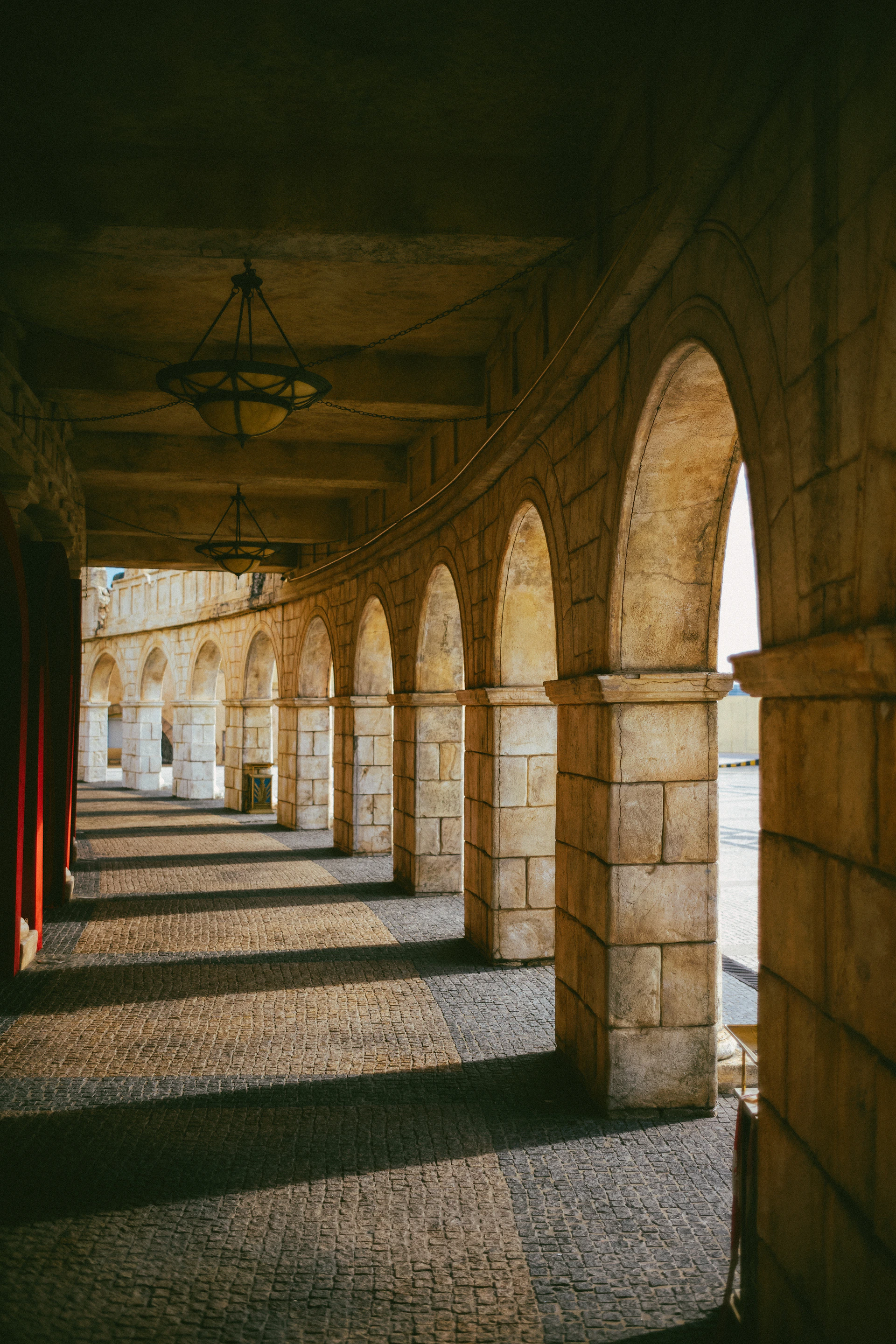 a row of arches in a stone building