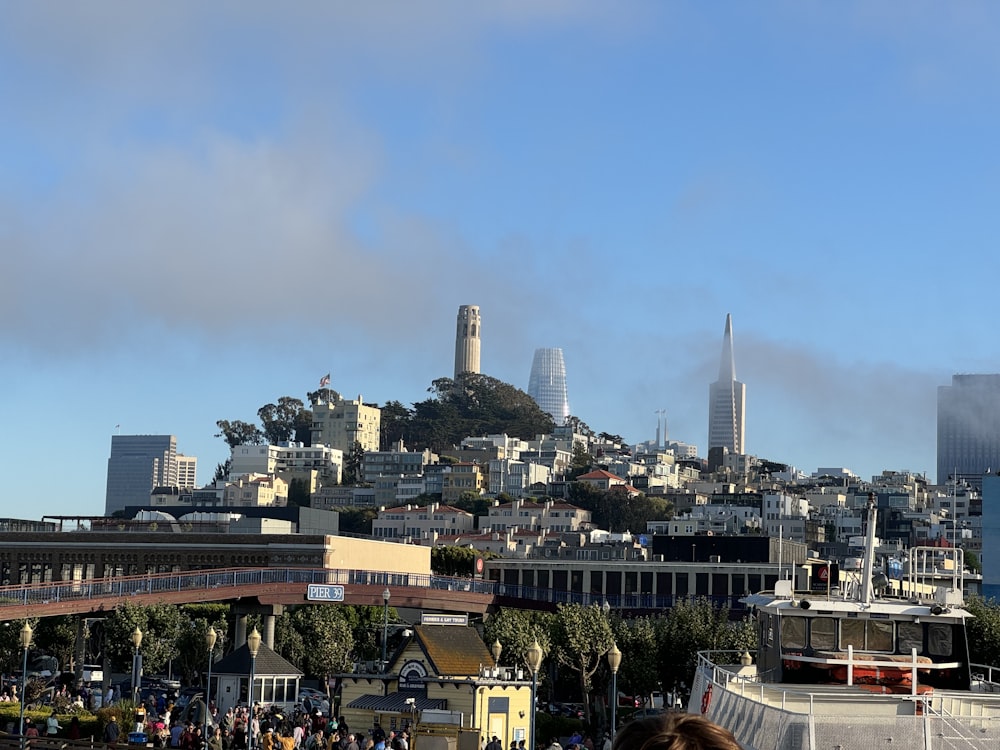 a view of a city with a hill in the background