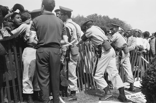 A group of security guards managing crowd at an event.