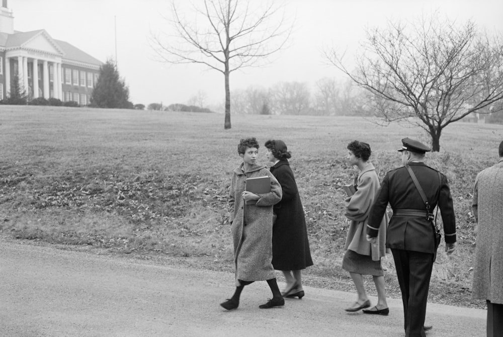 African American students walking up the driveway, outside Warren County High School, Front Royal, Virginia, during school integration.