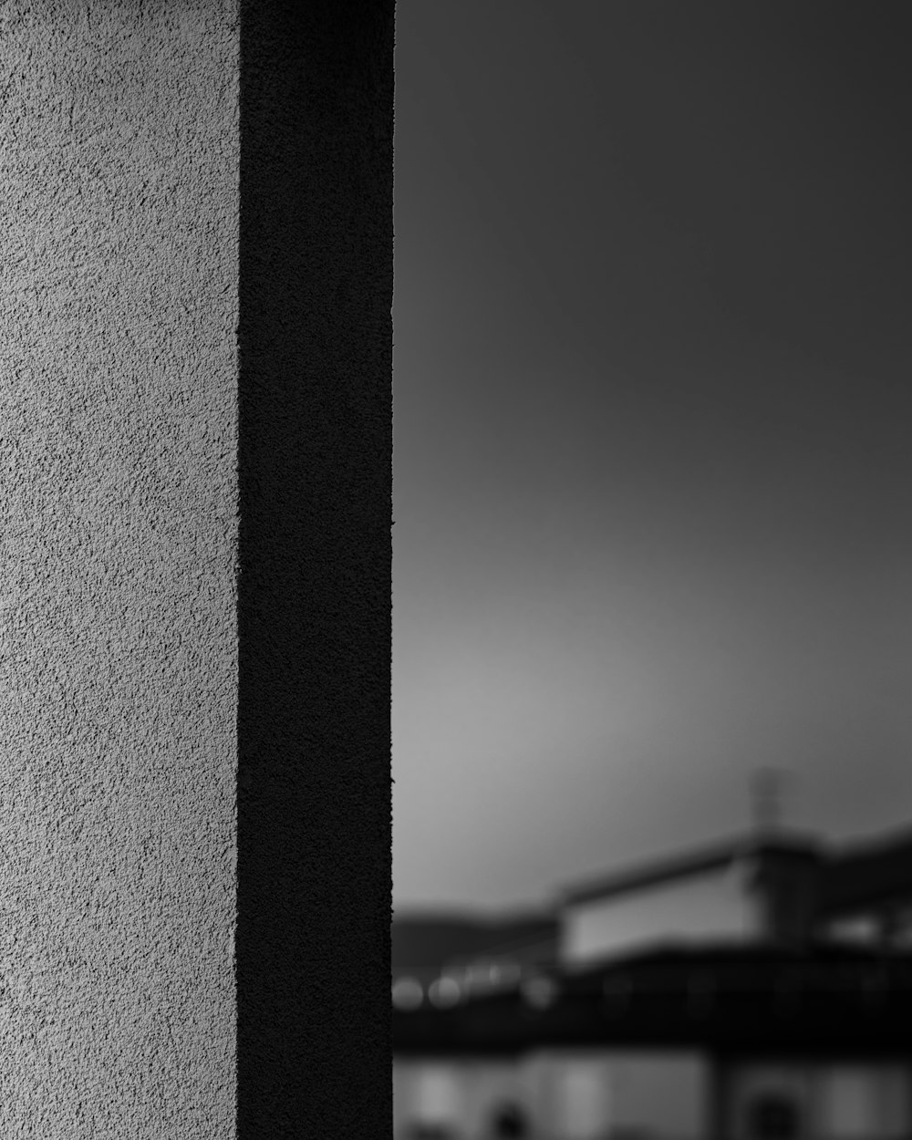 a black and white photo of a stop sign