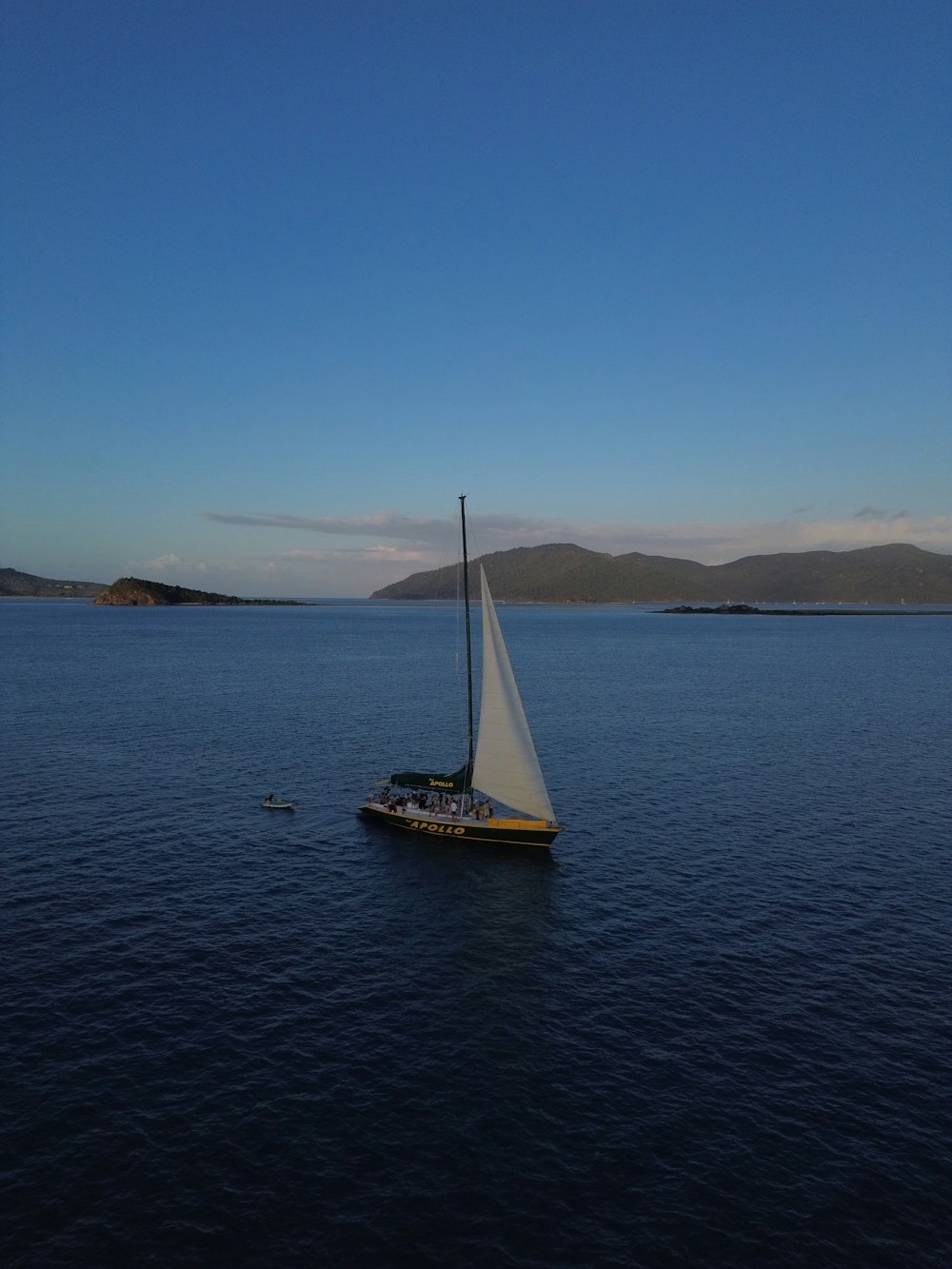 a sailboat in the middle of a large body of water