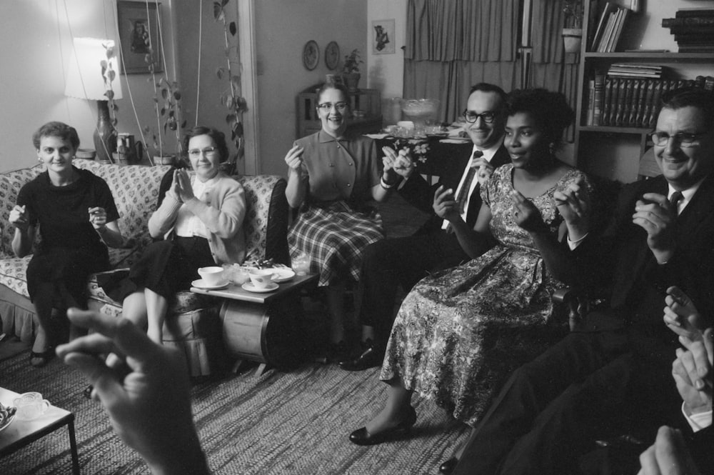 William and Daisy Myers, the first African American residents of Levittown, Pa., socializing with their neighbors.