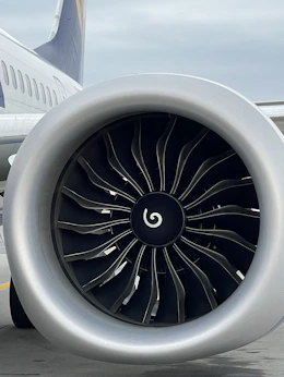 Close-up of a wide-body aircraft engine during inspection.