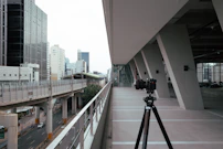 Behind-the-scenes image of a camera setup on a bustling Dubai street, capturing urban energy.