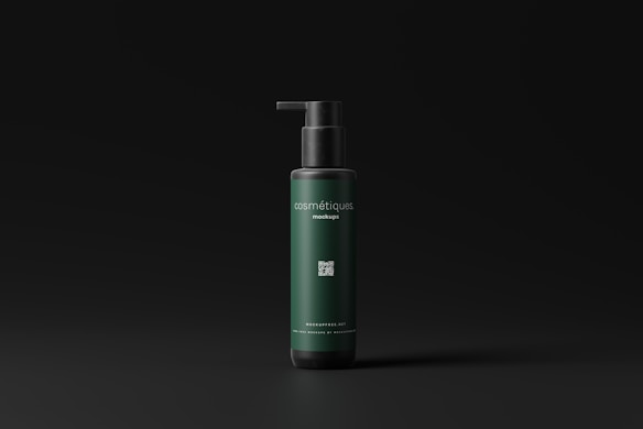 A sleek, dark green bottle with a black pump dispenser is set against a matte black background. The bottle features minimalist text branding, and the overall design exudes elegance and simplicity.