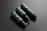 Three dark green cylindrical bottles with black caps and dispensers are arranged diagonally against a dark gray background. The bottles have 'cosmétiques mockup' written on them in white text along with QR codes and other fine text details.
