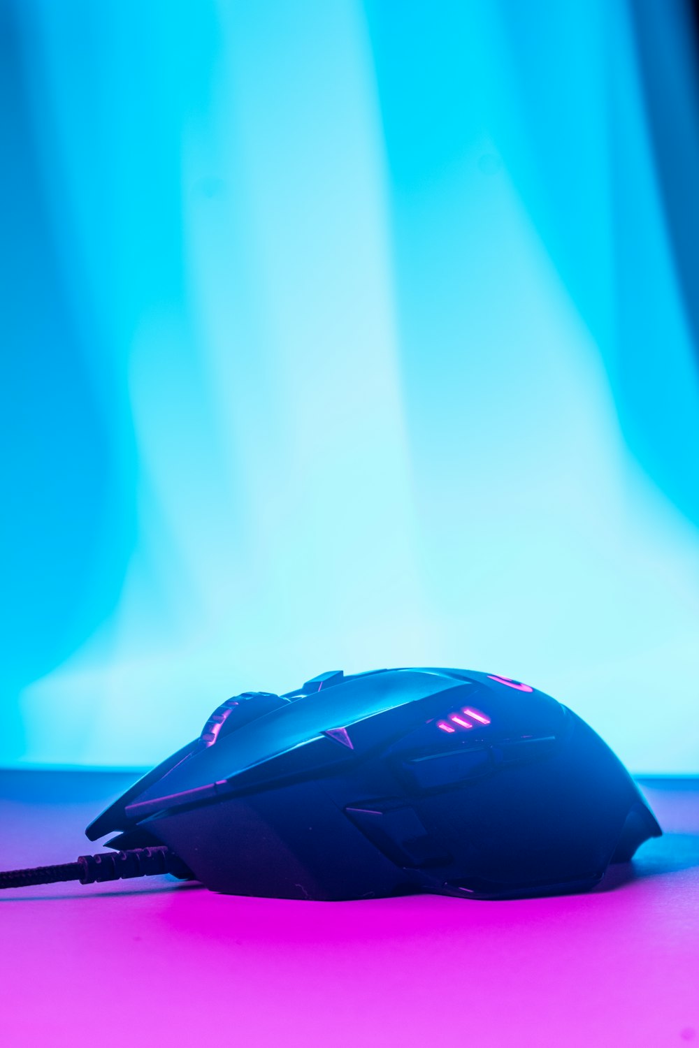 a computer mouse sitting on top of a table