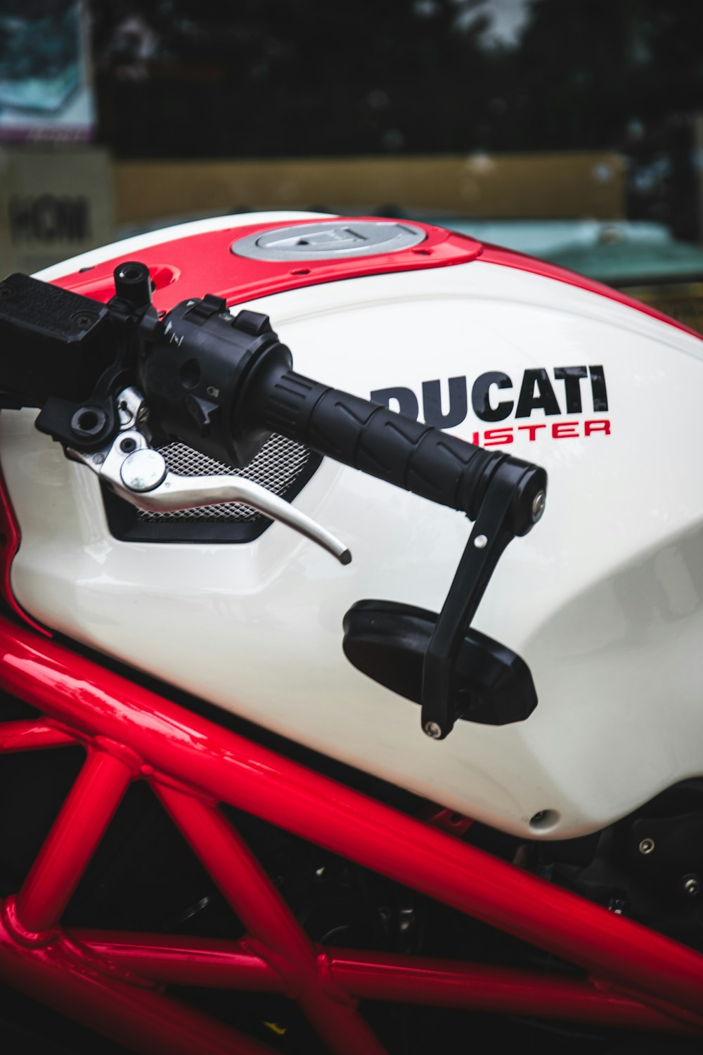 a close up of a red and white motorcycle