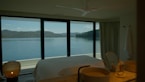 A serene bedroom with vastu-friendly elements and furnishings.