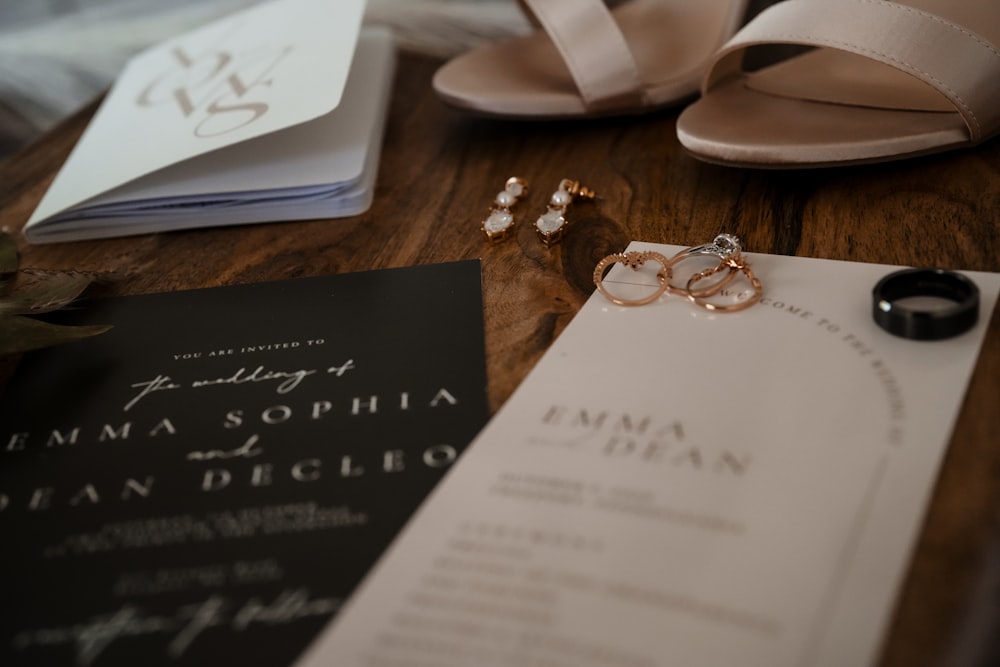 a couple of wedding rings sitting on top of a table