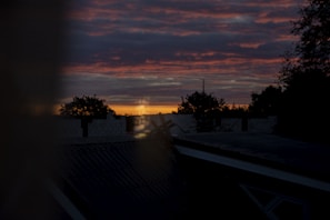 A scenic sunset captured from above, highlighting vibrant colors.