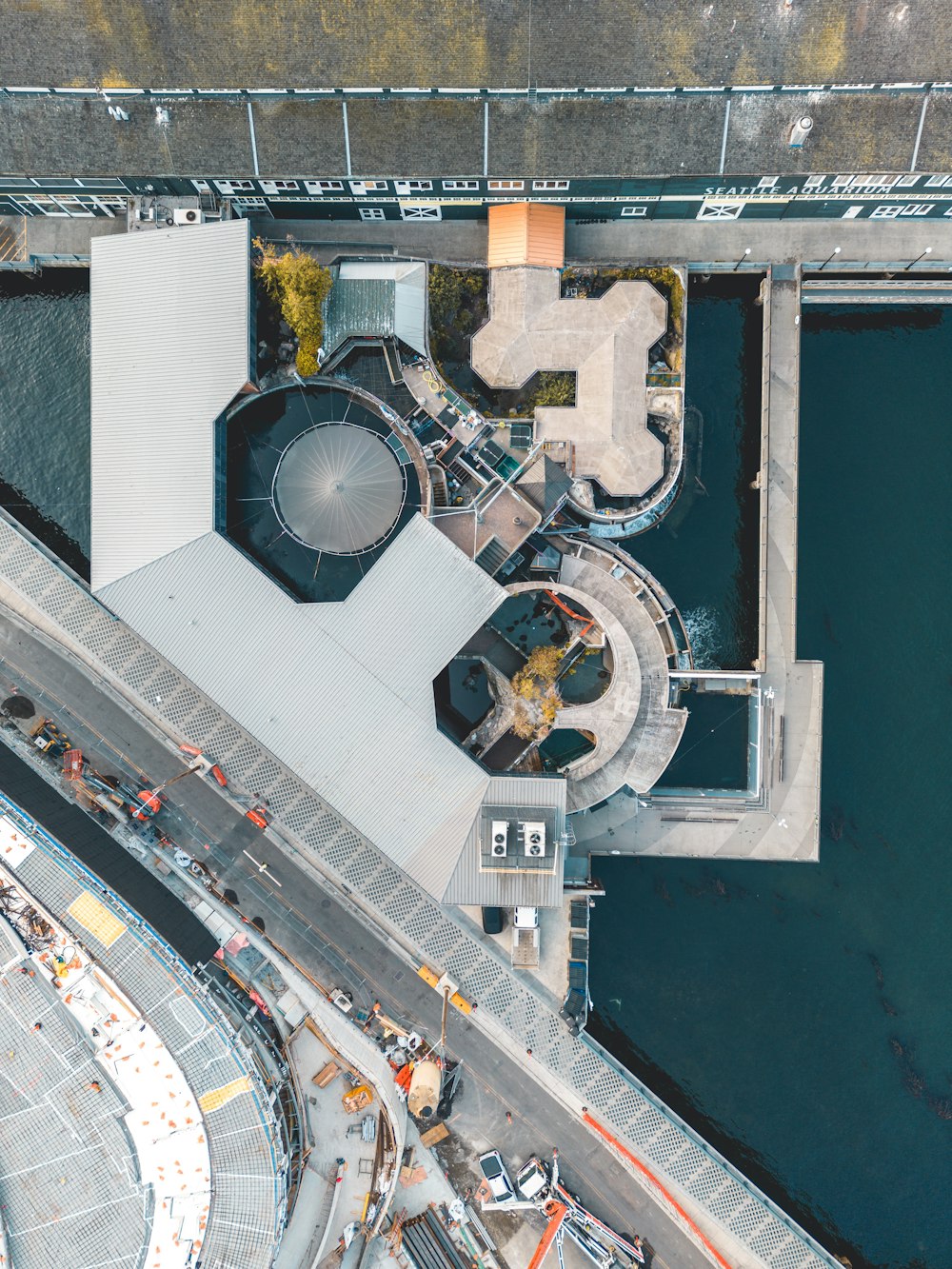 an aerial view of a bridge over a body of water