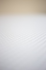 Asymmetrical layout shot with slow fade-in motion, textured with subtle grain.