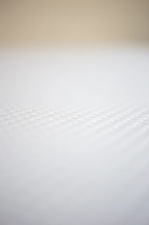 A wide-angle view softly faded, revealing more depth as you scroll over.
