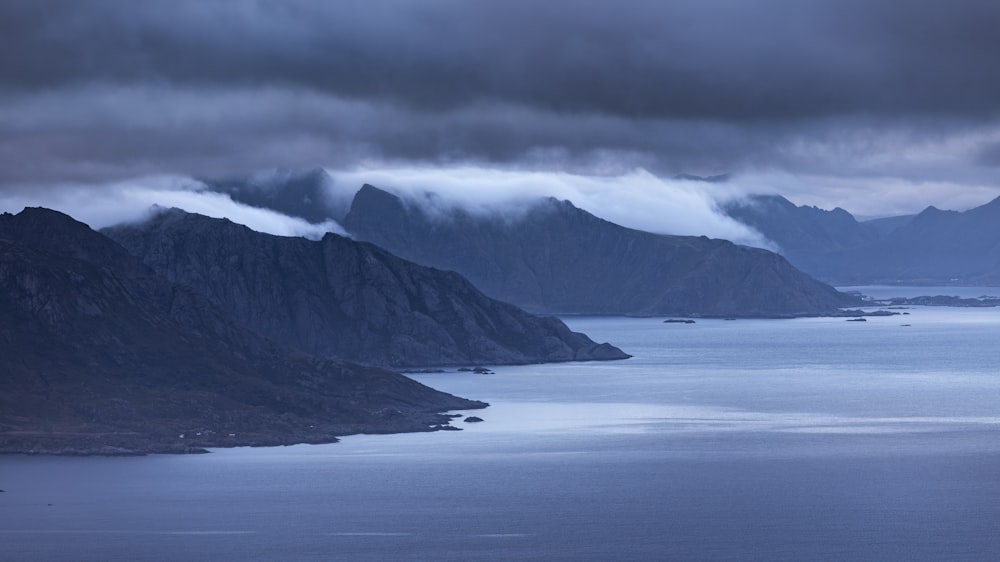 a large body of water surrounded by mountains