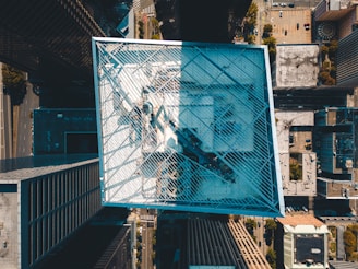 An aerial view of a cityscape with highlighted points of interest.