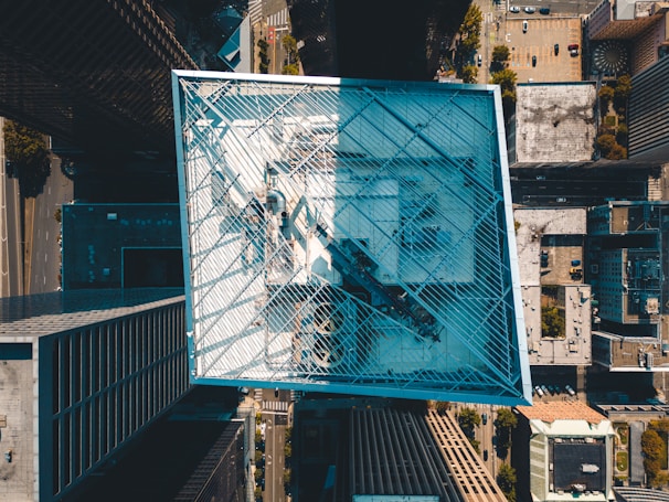 An aerial view of a cityscape with highlighted points of interest.